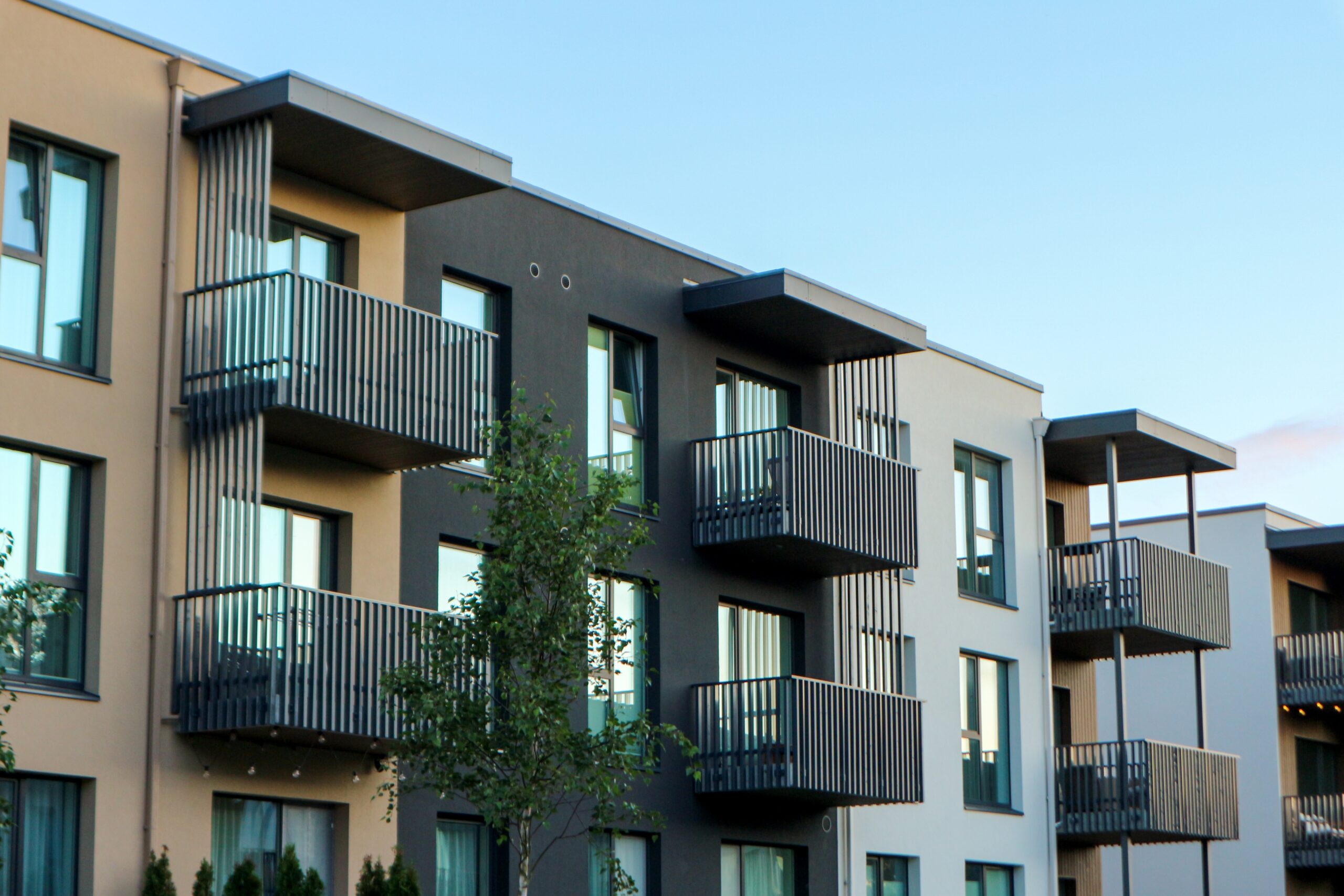 Modern mixed-use investment property at dusk